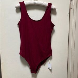 Women’s t-shirt  Burgundy Scoop necked low back bodysuit XL​